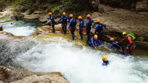 Group sliding in canyoning in the Gorges du Loup - Les Geckos
